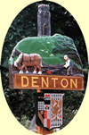 Denton Village Sign depicts a farmer ploughing a field in front of the church